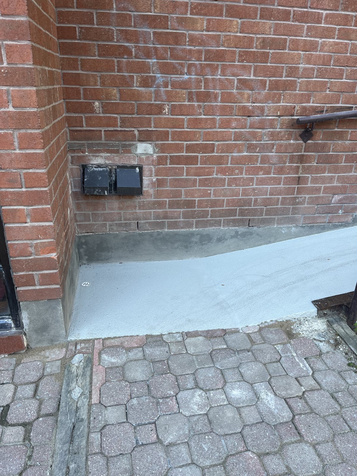 The same entrance corner rebuilt and finished