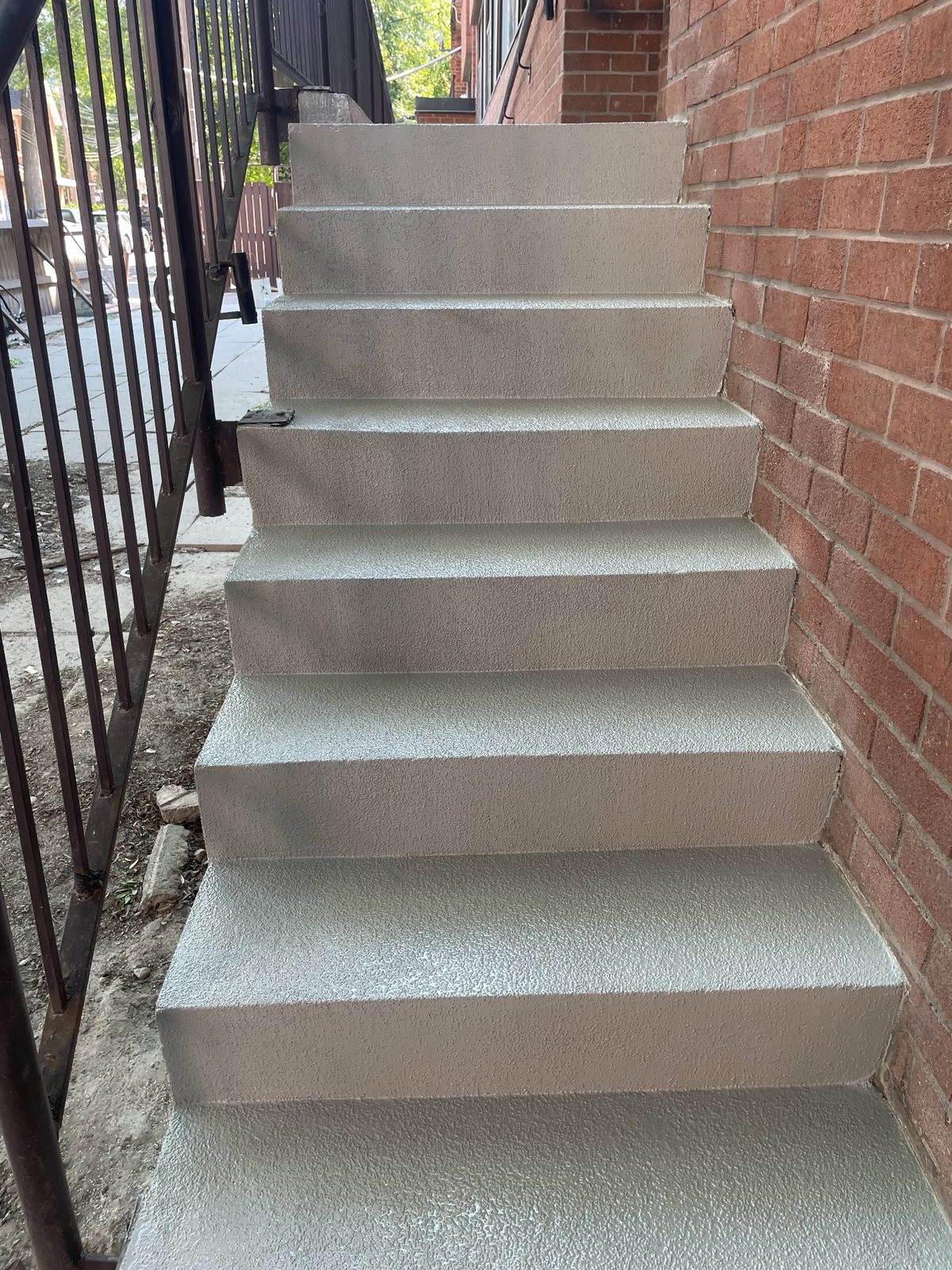Commercial entrance steps finished in a waterproof traffic coating